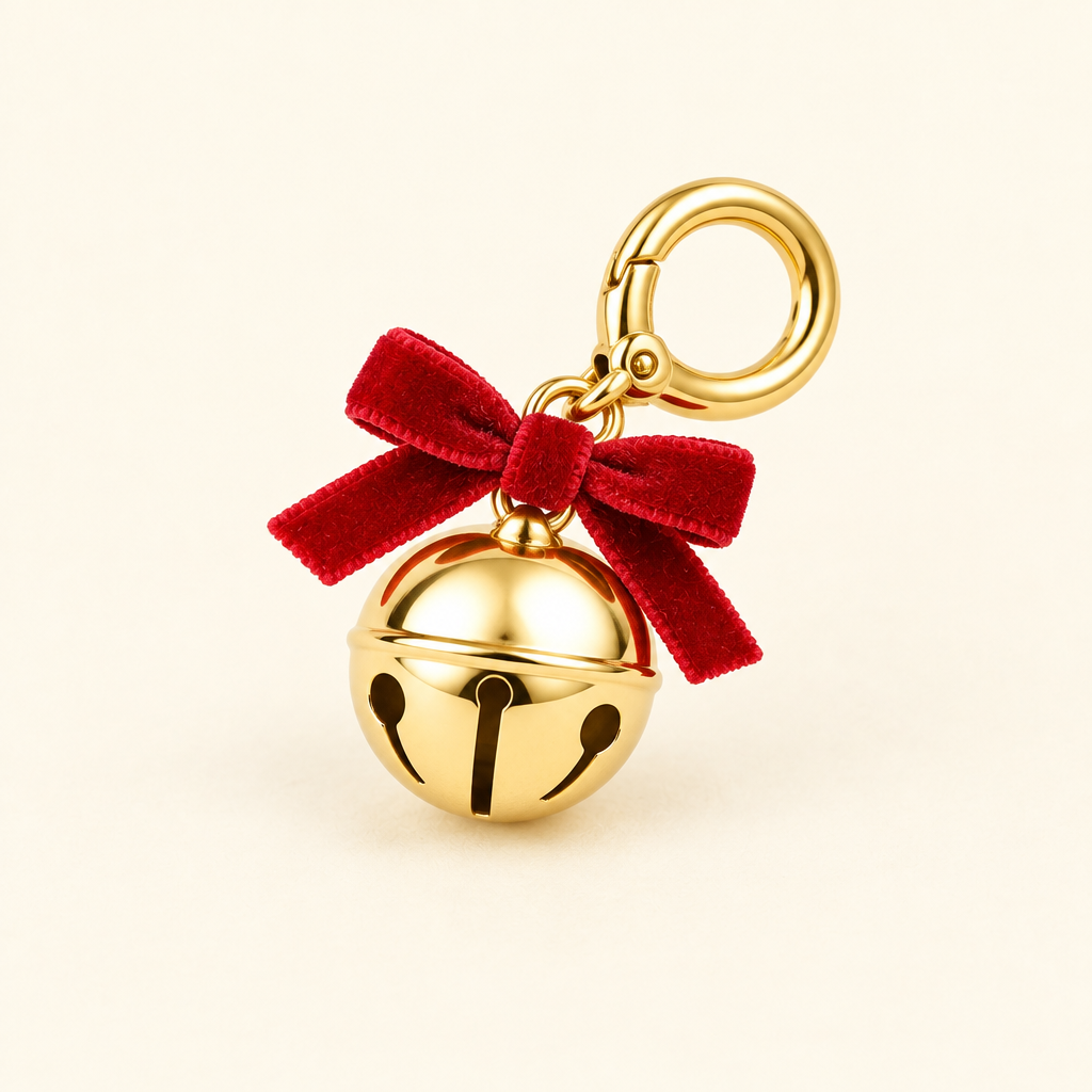 Gold jingle bell collar charm with red velvet bow
